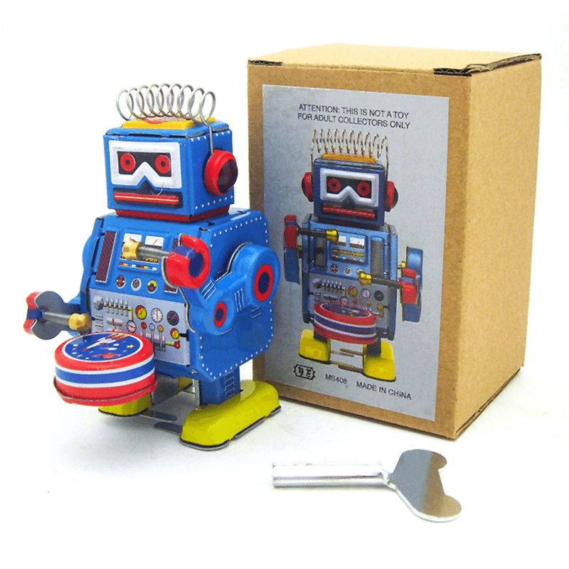 Klassisches Vintage-Uhrwerk, aufziehbare Trommel, spielender Roboter, Reminiszenz, Kinder-Blechspielzeug mit Schlüssel