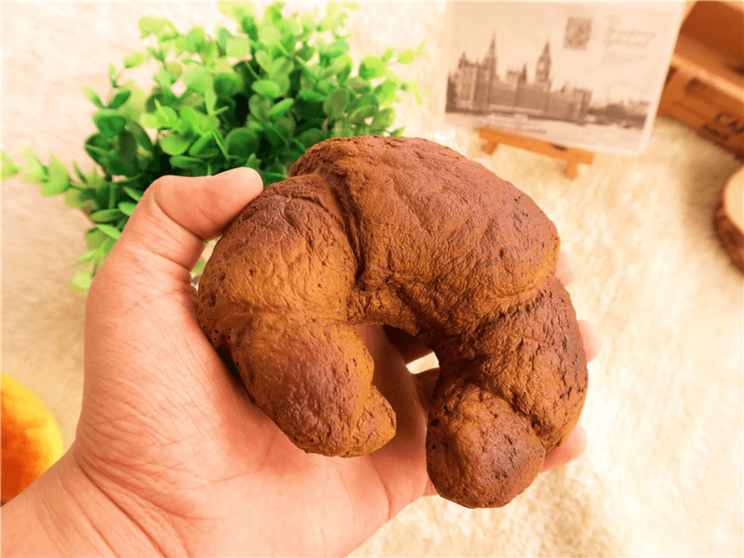 Croissant-Brot-Squishy, ​​13 cm, super langsam aufsteigend, Originalverpackung, Quetschspielzeug, lustiges Geschenk