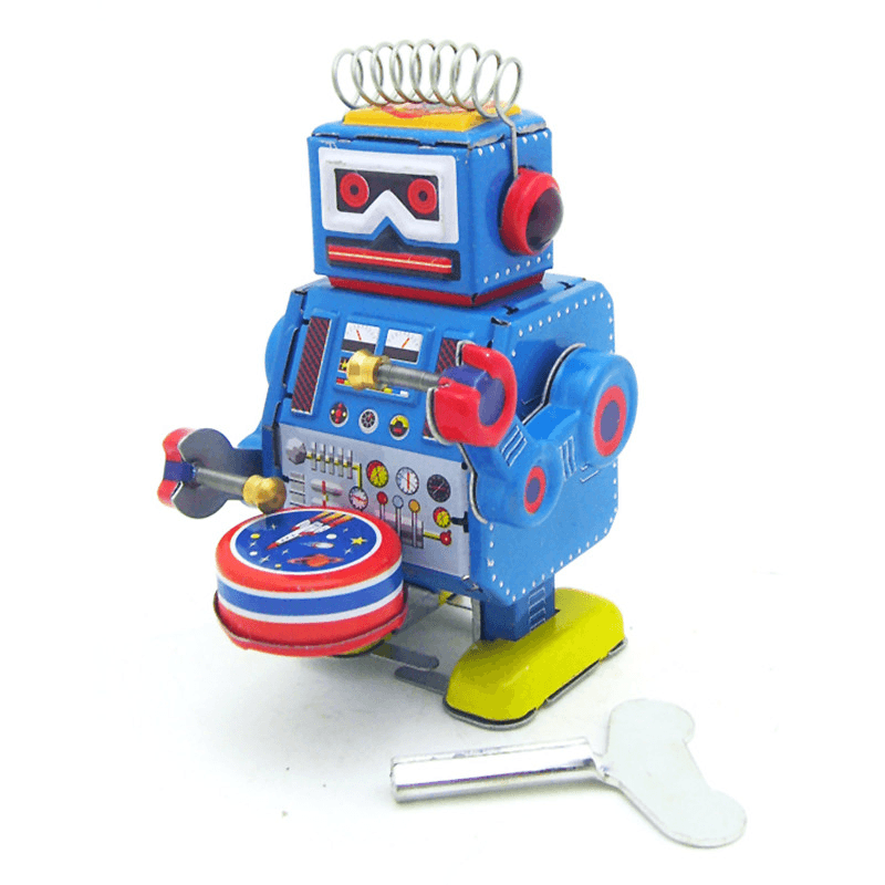 Klassisches Vintage-Uhrwerk, aufziehbare Trommel, spielender Roboter, Reminiszenz, Kinder-Blechspielzeug mit Schlüssel