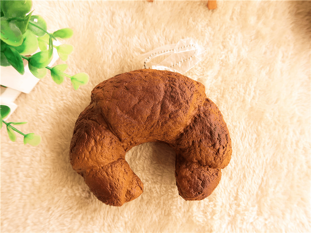 Croissant-Brot-Squishy, ​​13 cm, super langsam aufsteigend, Originalverpackung, Quetschspielzeug, lustiges Geschenk