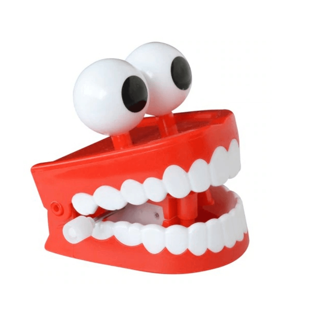 1Pc Clockwork Jumping Teeth Red Wind up Funny Mouth Tooth with Eyes Flashing Novelties Trick Toys