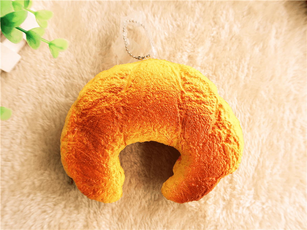 Croissant-Brot-Squishy, ​​13 cm, super langsam aufsteigend, Originalverpackung, Quetschspielzeug, lustiges Geschenk