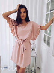 Solid color dress with ruffles and belt