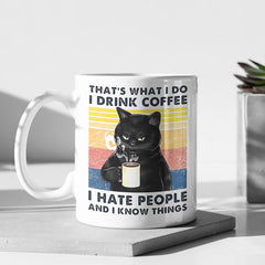 Lustige Kaffeetasse „Know Things“, Keramiktasse mit schwarzer Katze