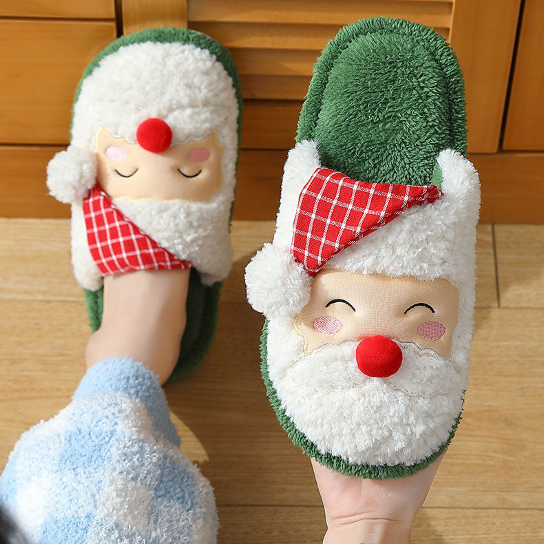 Simpatiche pantofole di peluche di Babbo Natale