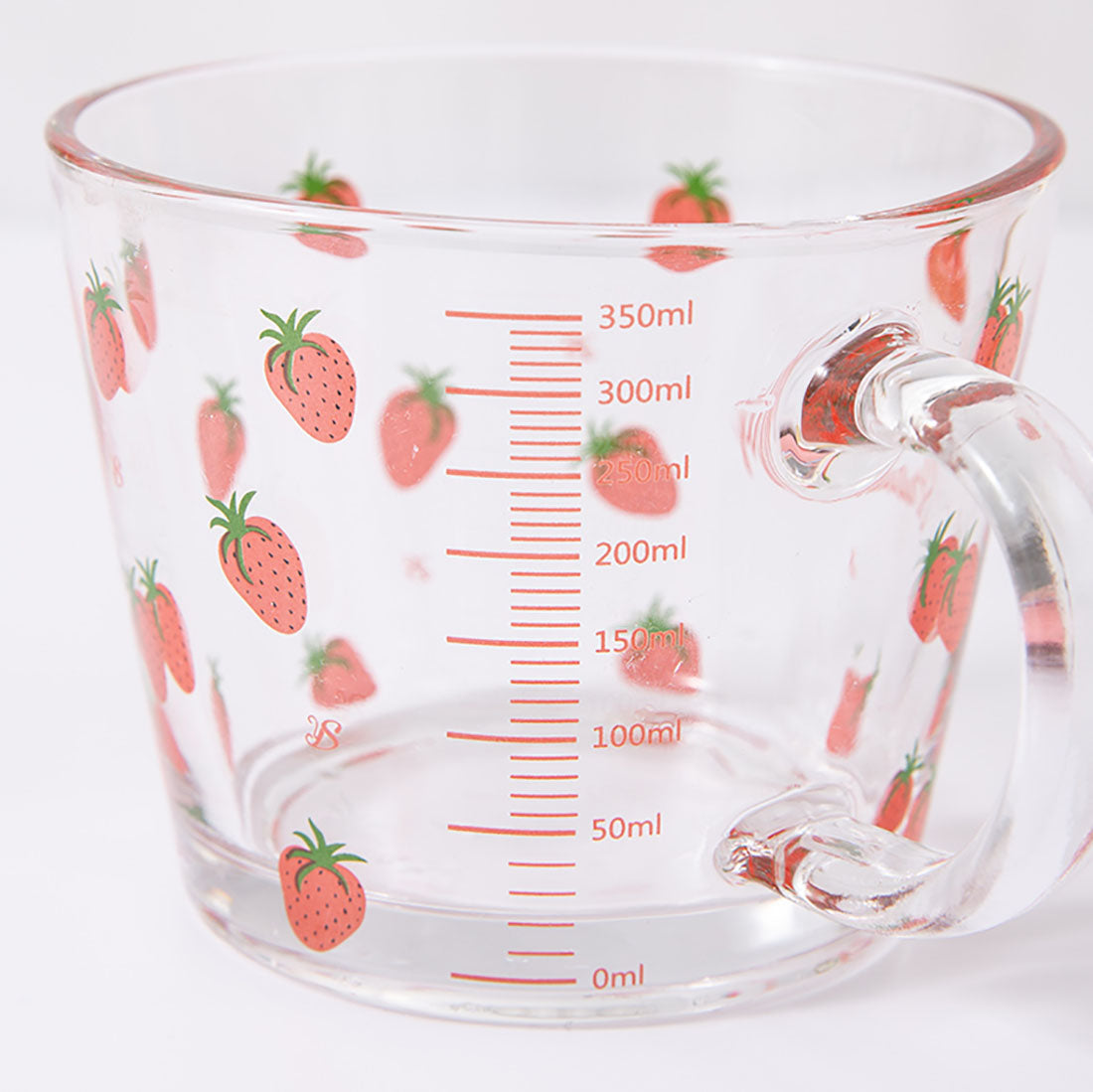 Simpatica tazza di vetro con coniglio alla fragola con cucchiaio