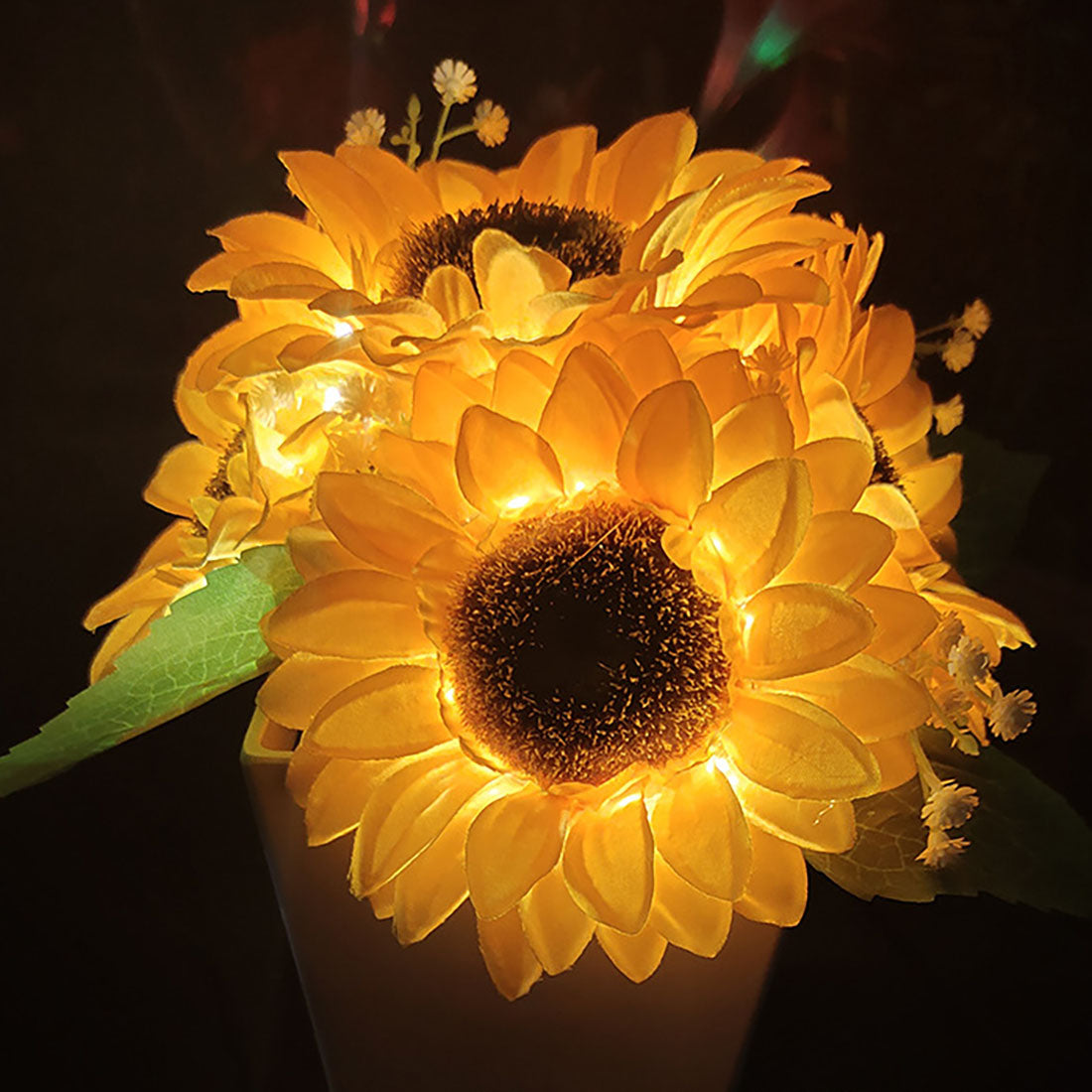 Luce creativa del vaso di girasole