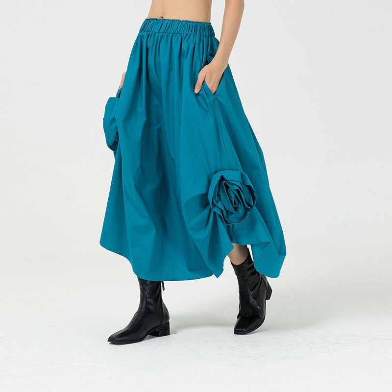 The three-dimensional flower bud skirt shows a thin floral decorative skirt, and the design is irregular skirt