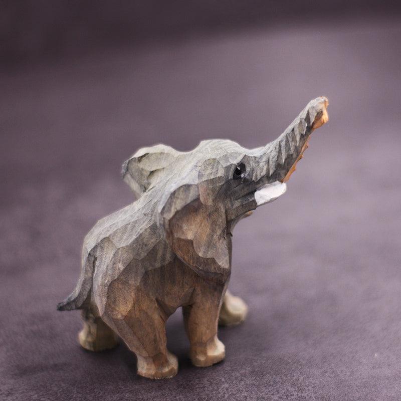 Figurines d'éléphants sculptées à la main en bois peint