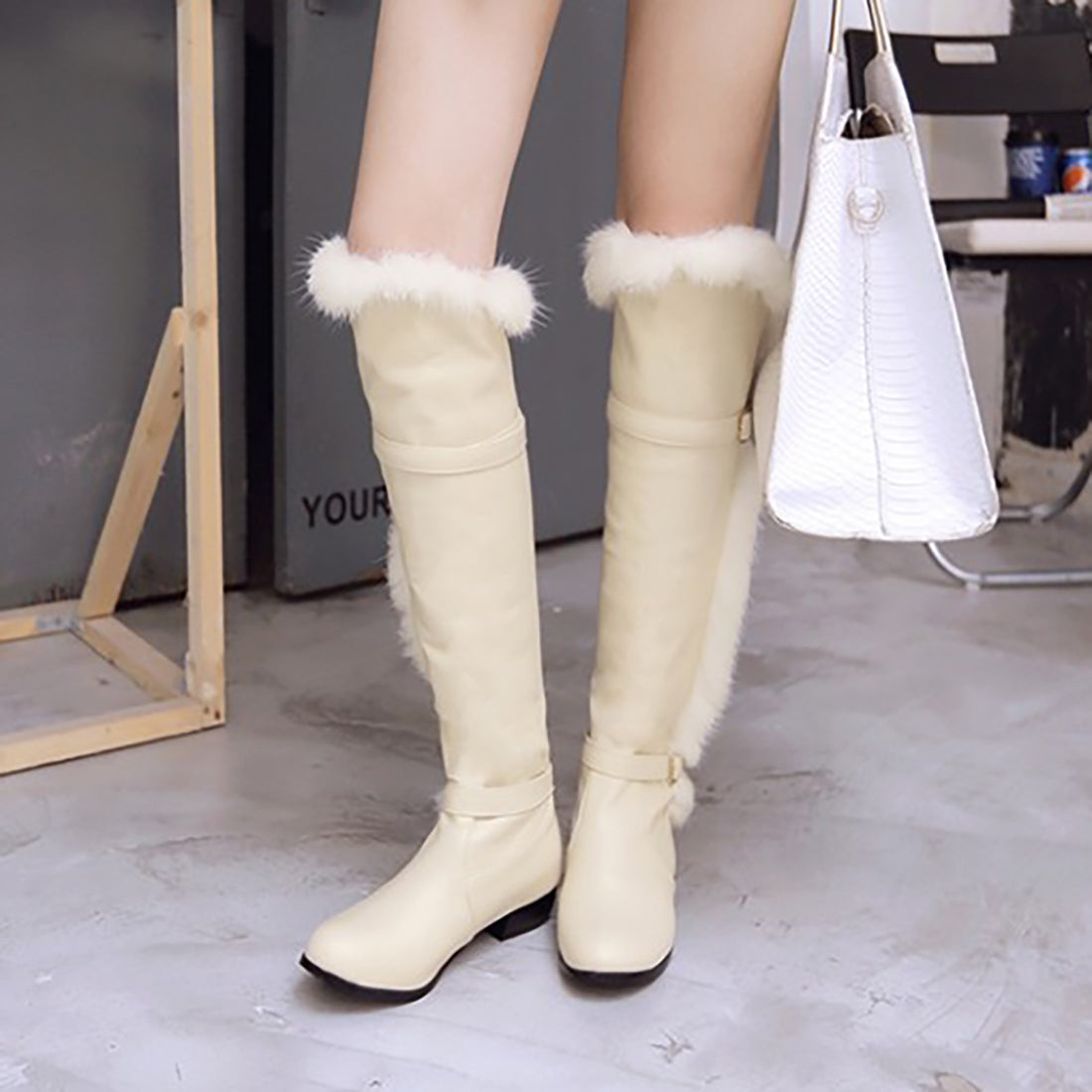 Bottes d'hiver au genou chics en fausse fourrure