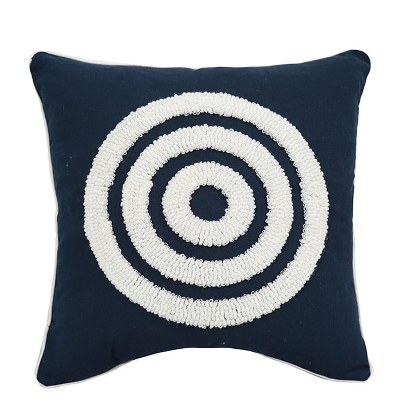 La collection de housses de coussin brodées en cercle concentrique