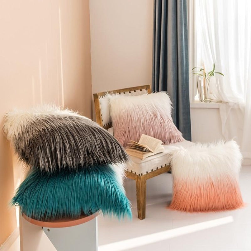 La taie d'oreiller colorée en faux angora