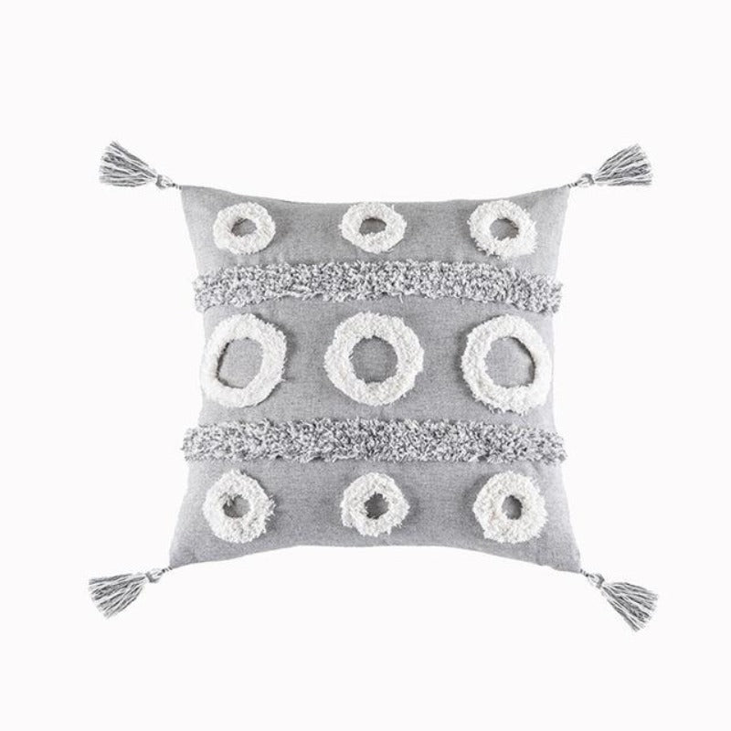 La collection de housses de coussin touffetée Global Citizen