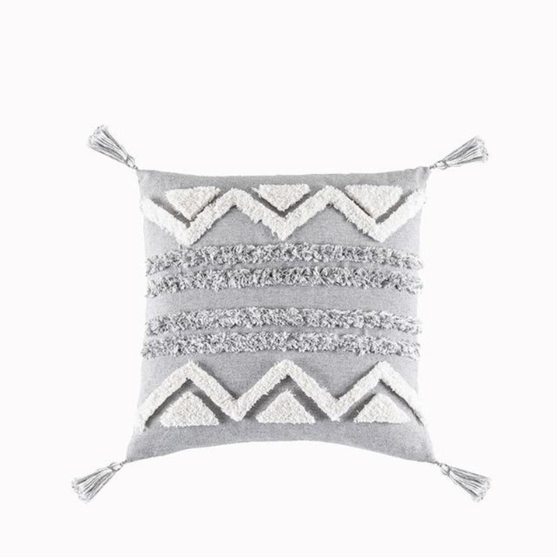 La collection de housses de coussin touffetée Global Citizen