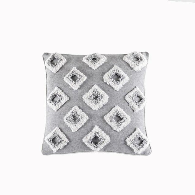 La collection de housses de coussin touffetée Global Citizen