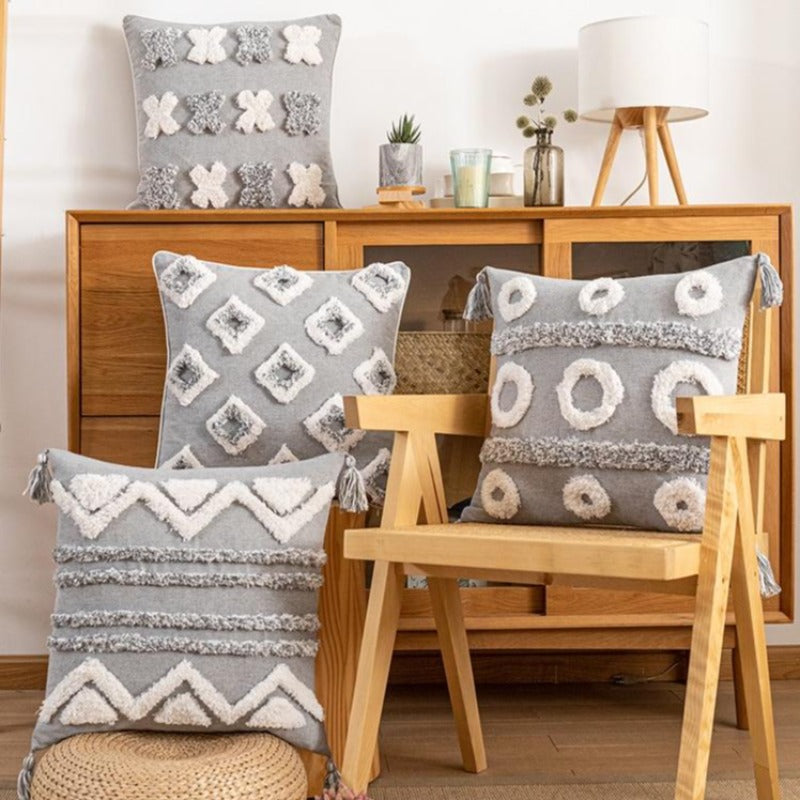 La collection de housses de coussin touffetée Global Citizen