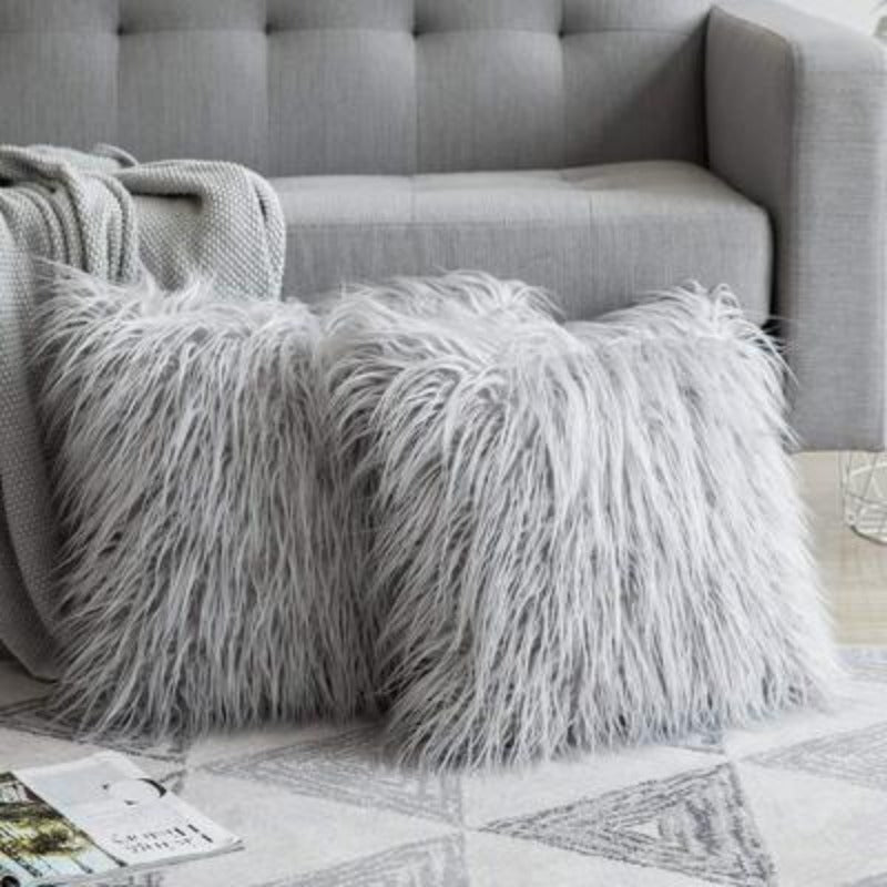 La housse de coussin en fausse fourrure Quintessential